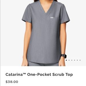 Figs one pocket grey Medium top. Never opened.